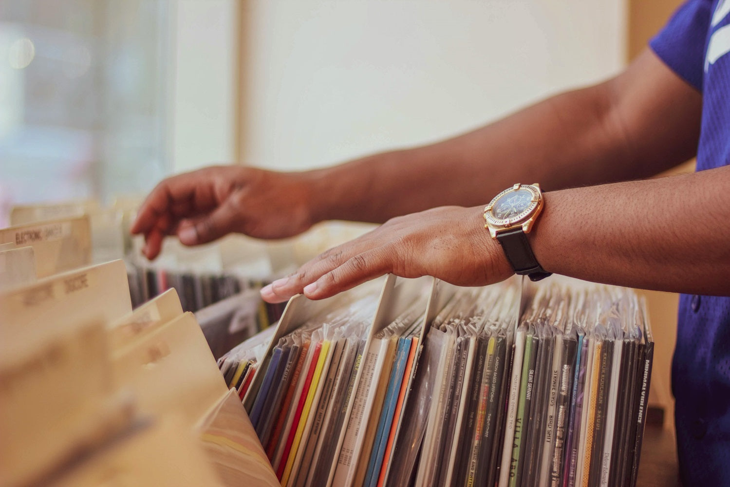 Man browsing vinyl records