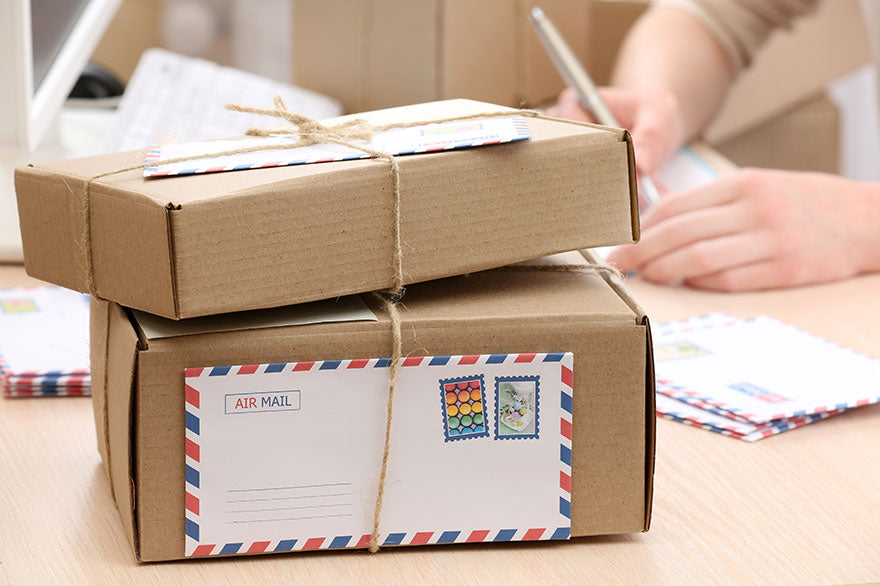 Cardboard boxes on work place in post office